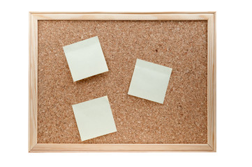 different sticky notes on a cork board isolated