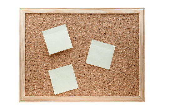 different sticky notes on a cork board isolated