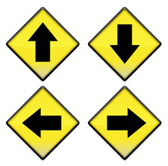 Group of four yellow road signs with arrows