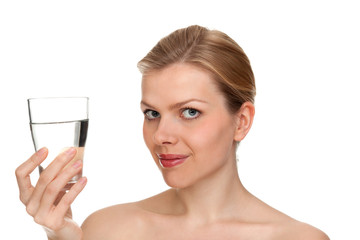 woman holding a glass of fresh water
