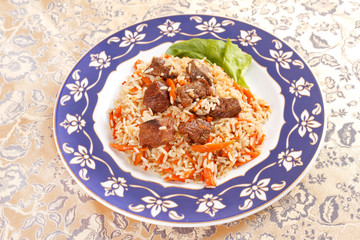 Uzbek national dish - plov on the plate