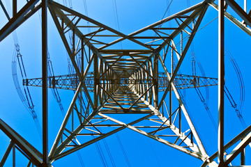 High voltage tower on a background with sky