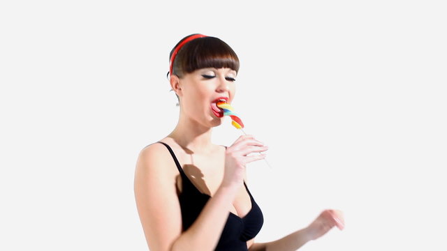Sexy woman eat candy and smile