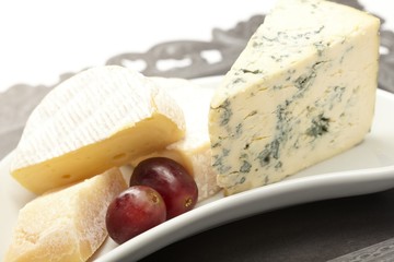 Cheese plate with grapes