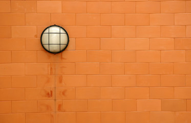 lamp on brickwall