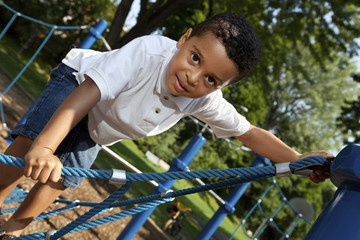 Young boy playing at a park