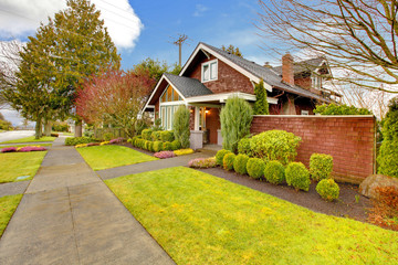 Fototapeta premium Spring exterior house with brown siding