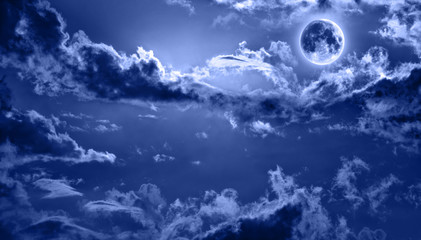 romantic night sky lit by full moon