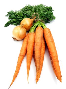 Carrots & onions vegetables on a white background