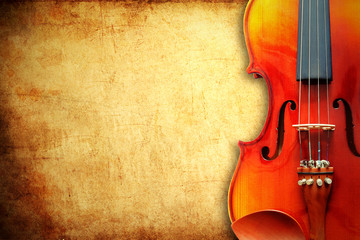 violin on grunge paper background with space