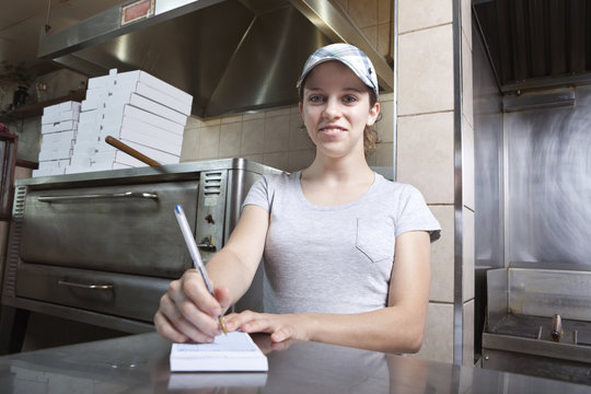 Take out order waitress in a fast food restaurant