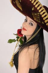 young woman wearing a traditional mexican sombrero