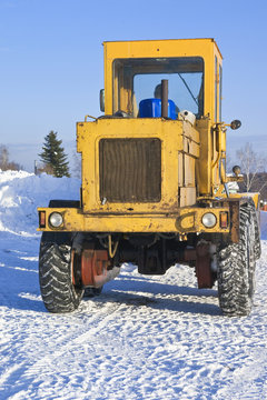 Big tractor on snow
