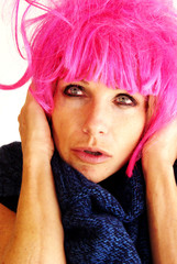 Pretty woman in pink wig closeup