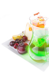 fruit icecream and beverage on plate