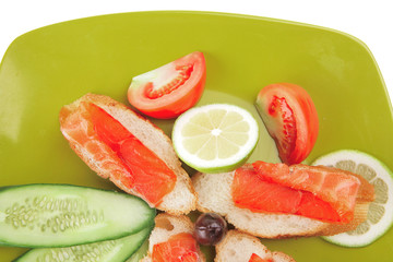 sandwich with salmon on green