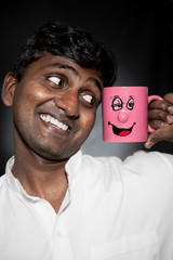 Indian man with funny mug