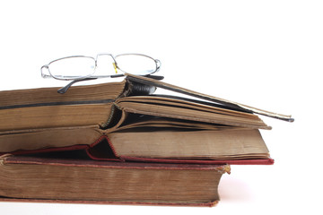 Glasses on old study-books