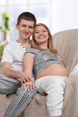 Young pregnant couple