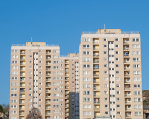 Fototapeta na wymiar Apartment Blocks against a Blue Sky