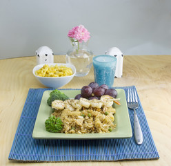 garlic shrimp scampi meal on blue placemat