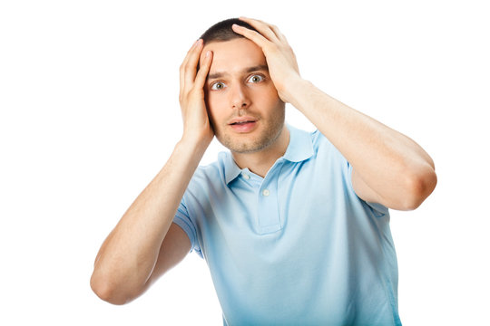 Puzzled man, isolated on white background