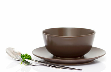 Plate, bowl, spoon and fork