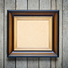 Old wooden frame with an empty cardboard