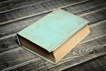 Vintage book a on wooden table