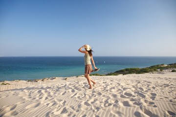 woman walking over Atlantic ocean