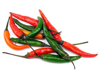 A selection of mixed chillies on a white background