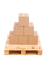 cardboard boxes on wooden palette