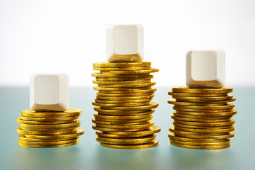 Three blank block over gold coins