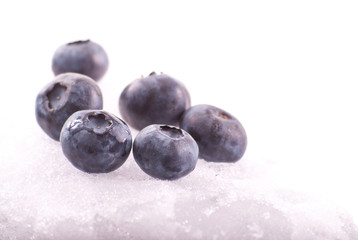 Close Up of Blackberries on Ice Chunk