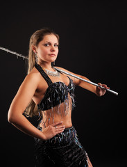 woman dance in oriental arabia costume with cane