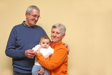 grandfather, grandmother with baby grandson