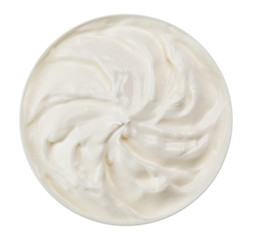 Sour cream in small round plate