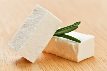 Feta cheese cubes with rosemary twig