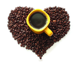 coffee beans and a yellow cup