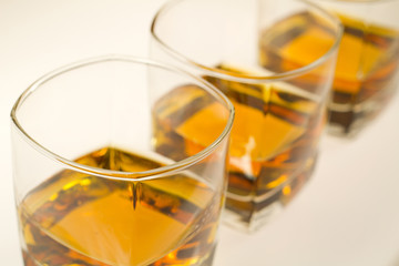 three glasses of whiskey