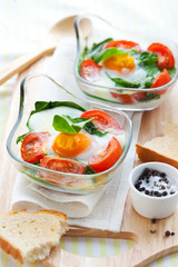 Baked egg with tomatoes and spinach