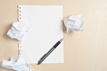 Page and crumpled paper