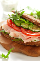 Sandwich with ham and vegetables