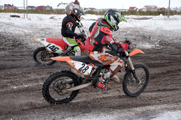 Russia, Samara March 6,2011, motocross rider two accelerated