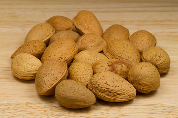 Soft-shelled Almonds on beige background