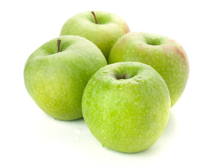 Four ripe green apples