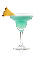 Blue tropical cocktail in margarita glass