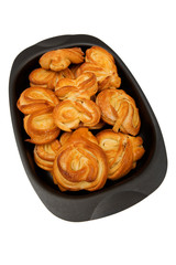rolls in the pan on white close up