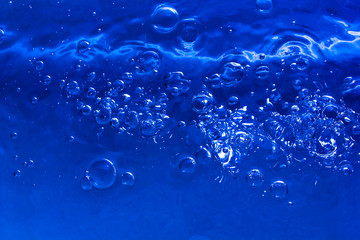 blue water with bubbles and drops background
