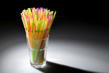 Multicolor flexible straws in the glass
